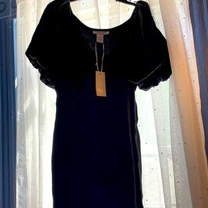 Bubble sleeves black mini dress! On trend, great for the holidays!